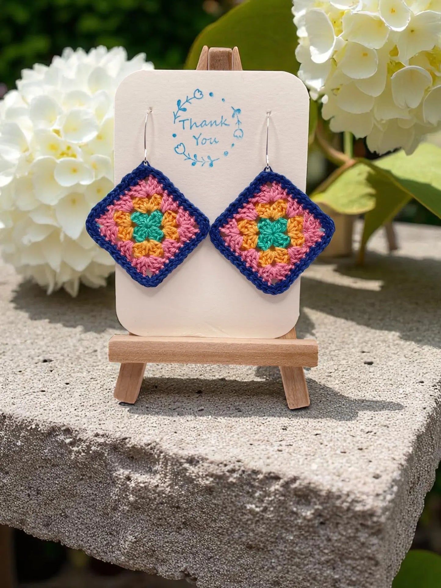 Granny Square earring with bright blue outline Tangles & Twine