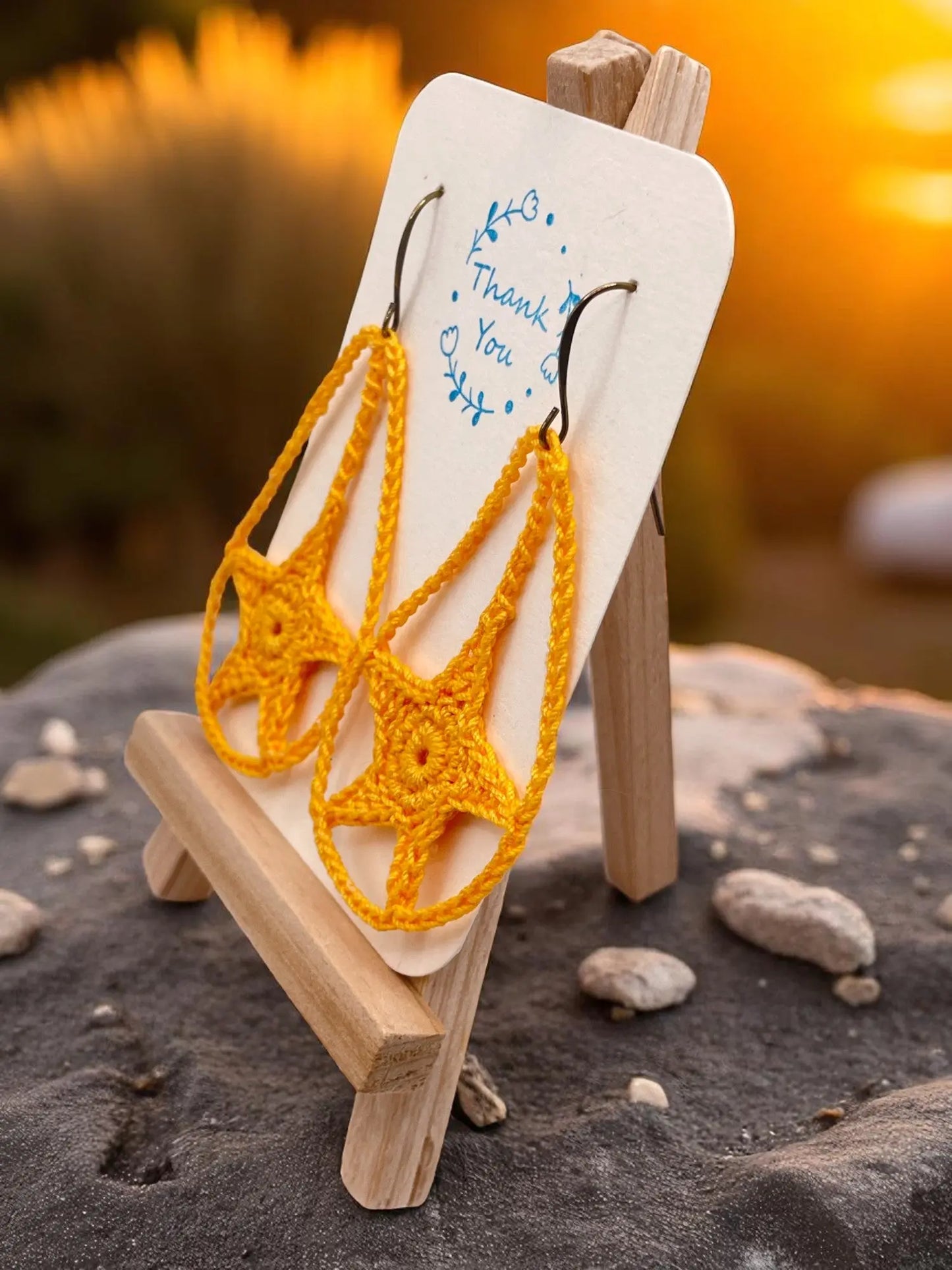 Dangling star in yellow Tangles & Twine