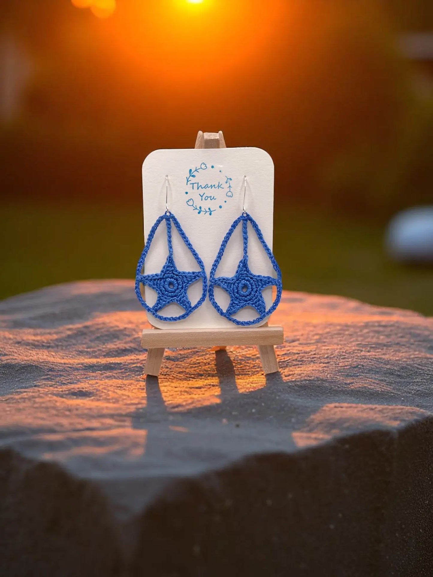 Dangling star in blue Tangles & Twine