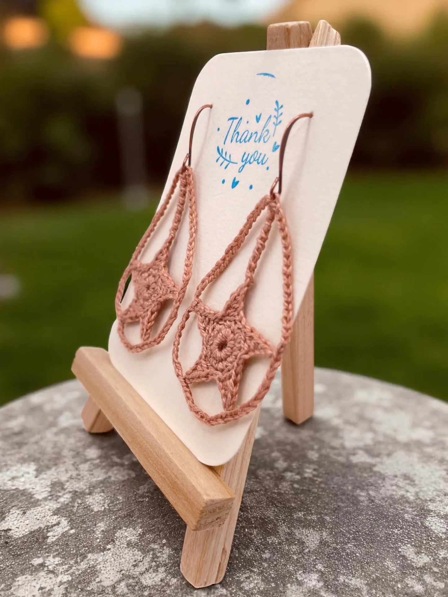 Dangling star in tan Tangles & Twine