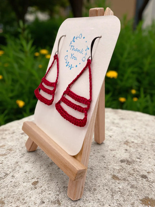 Dangling smiles in maroon Tangles & Twine