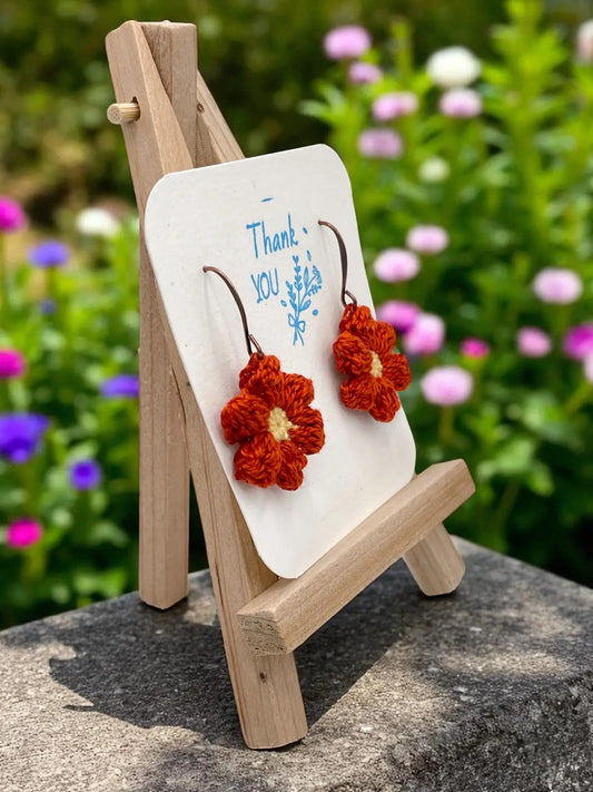 Dangly Puff Flower in burnt orange Tangles & Twine