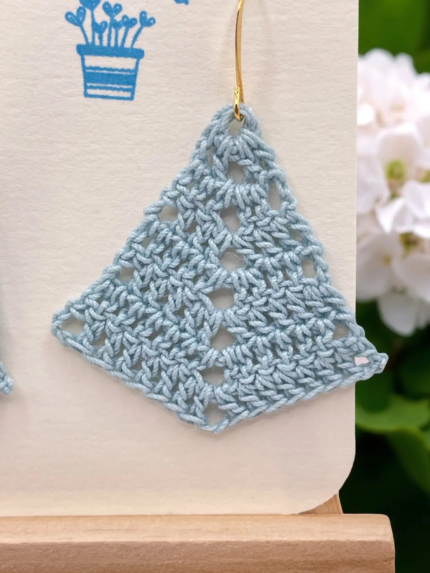 Simple triangle in light blue Tangles & Twine