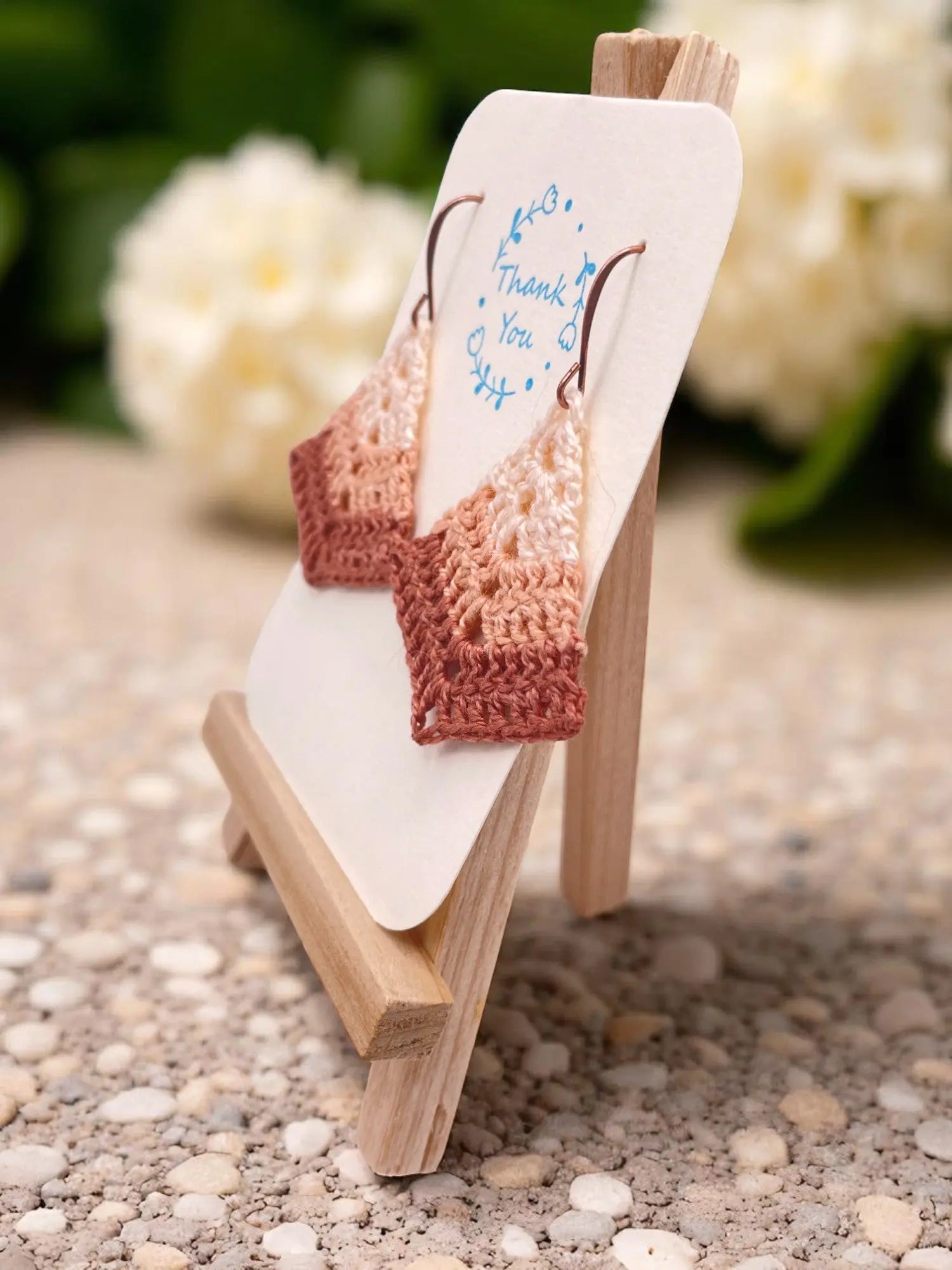 Simple triangle in shades of blush Tangles & Twine