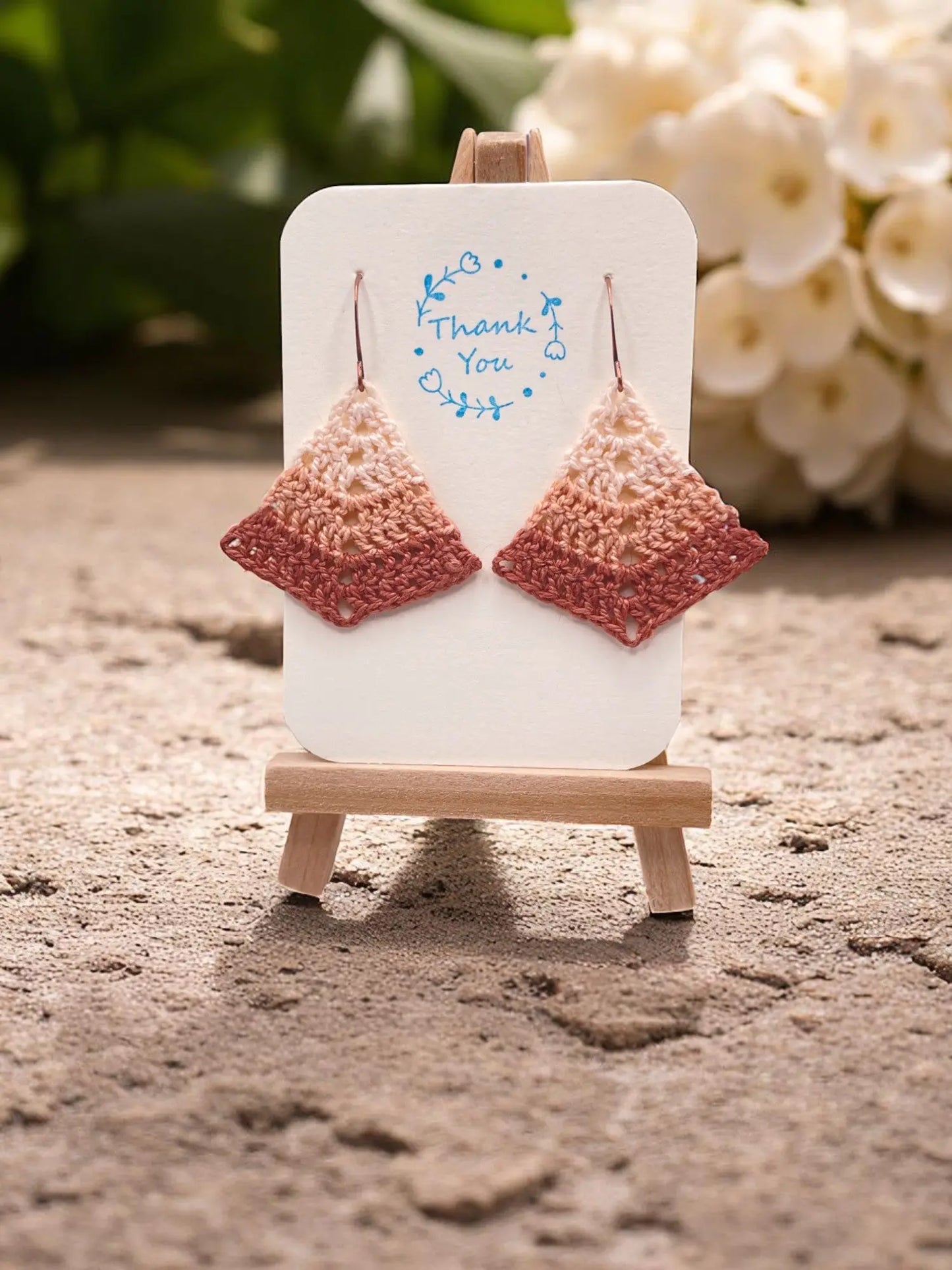 Simple triangle in shades of blush Tangles & Twine