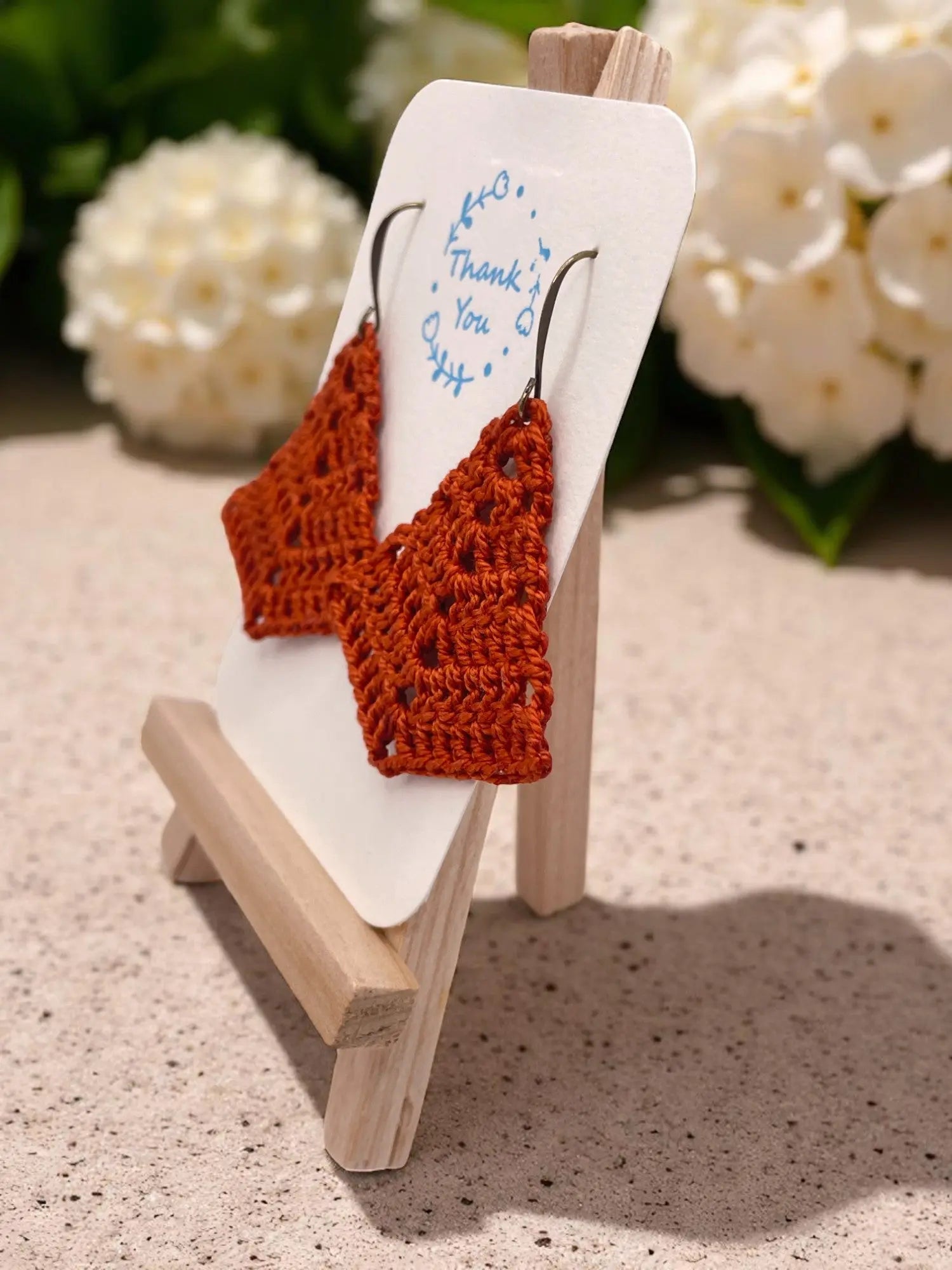 Simple triangle in burnt orange Tangles & Twine