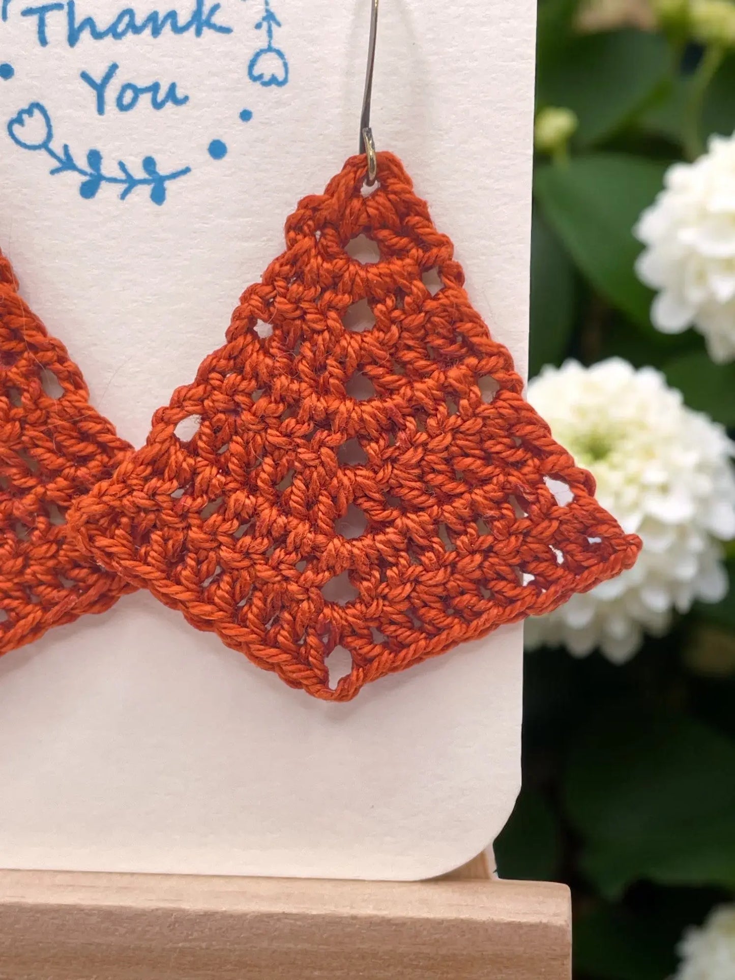 Simple triangle in burnt orange Tangles & Twine