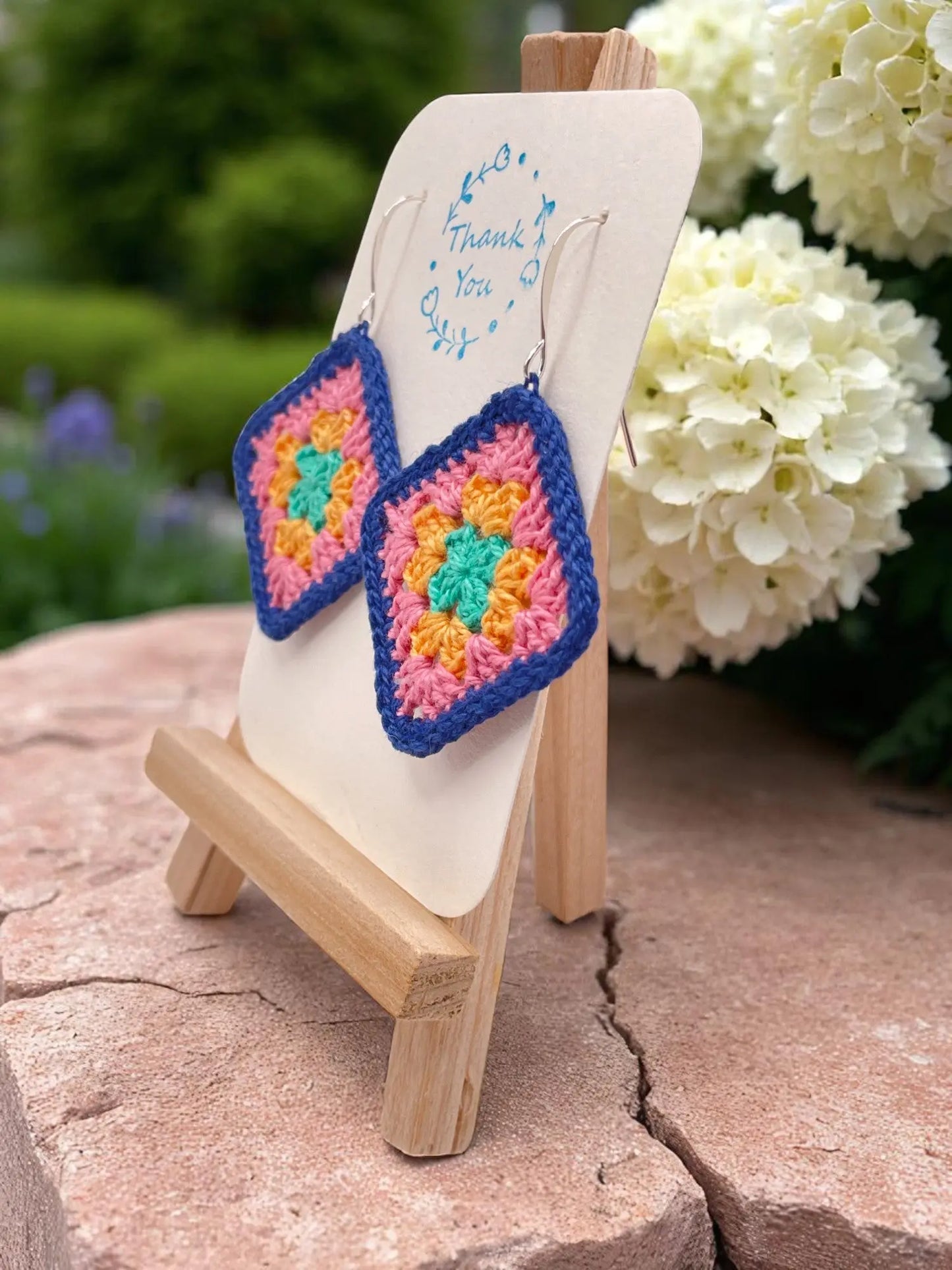 Granny Square earring with bright blue outline Tangles & Twine