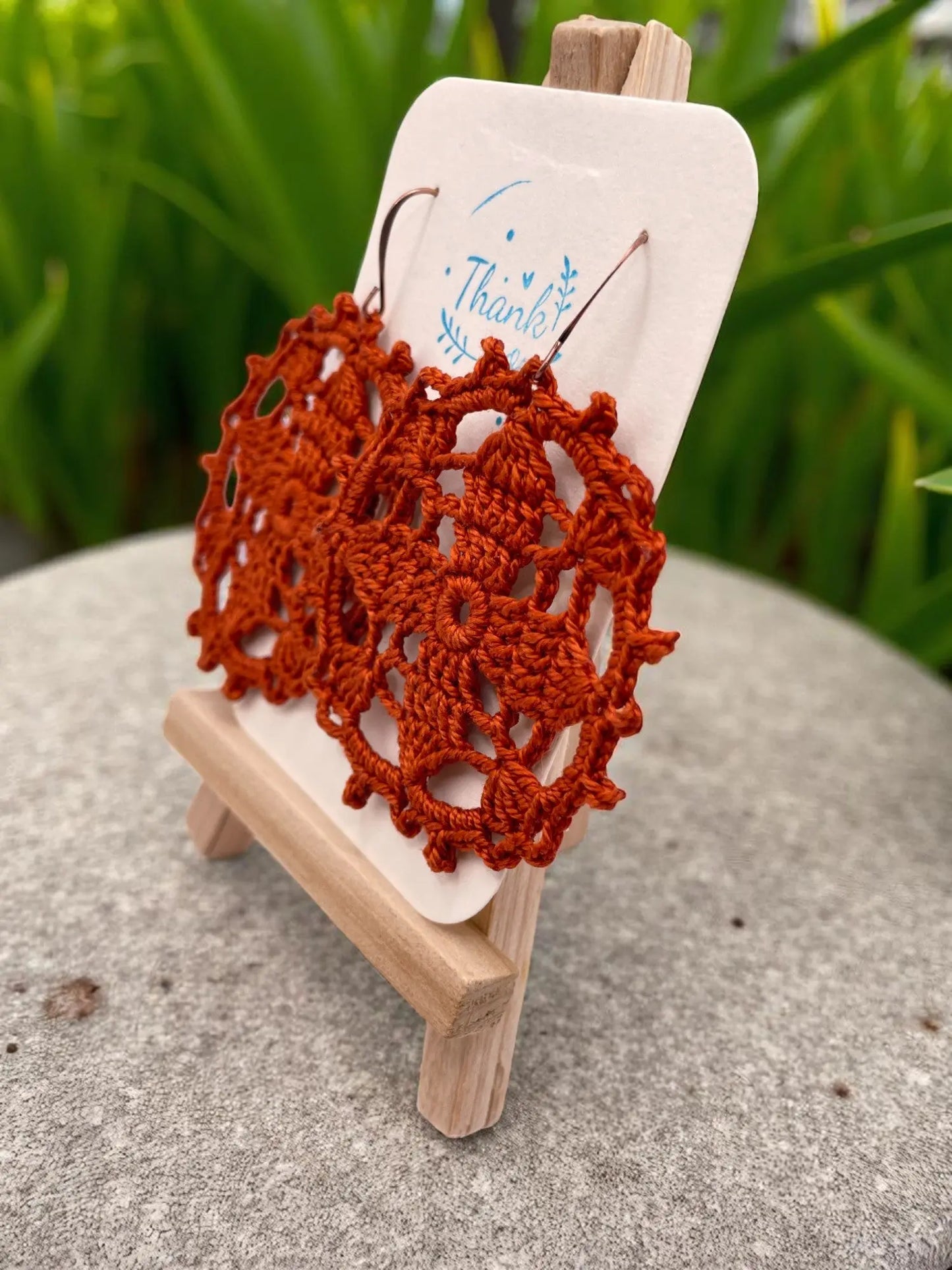 Circular earring in burnt orange Tangles & Twine