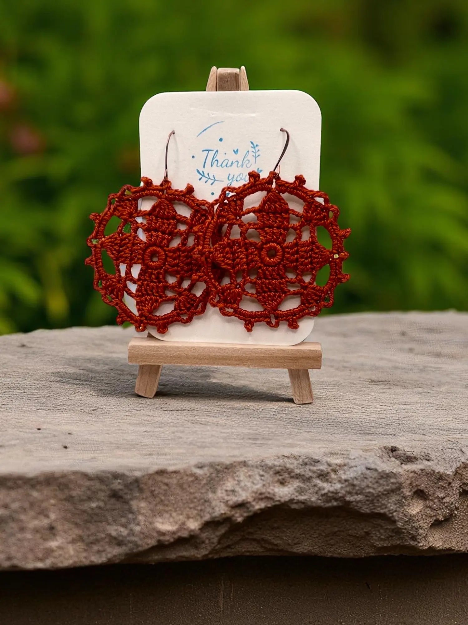 Circular earring in burnt orange Tangles & Twine