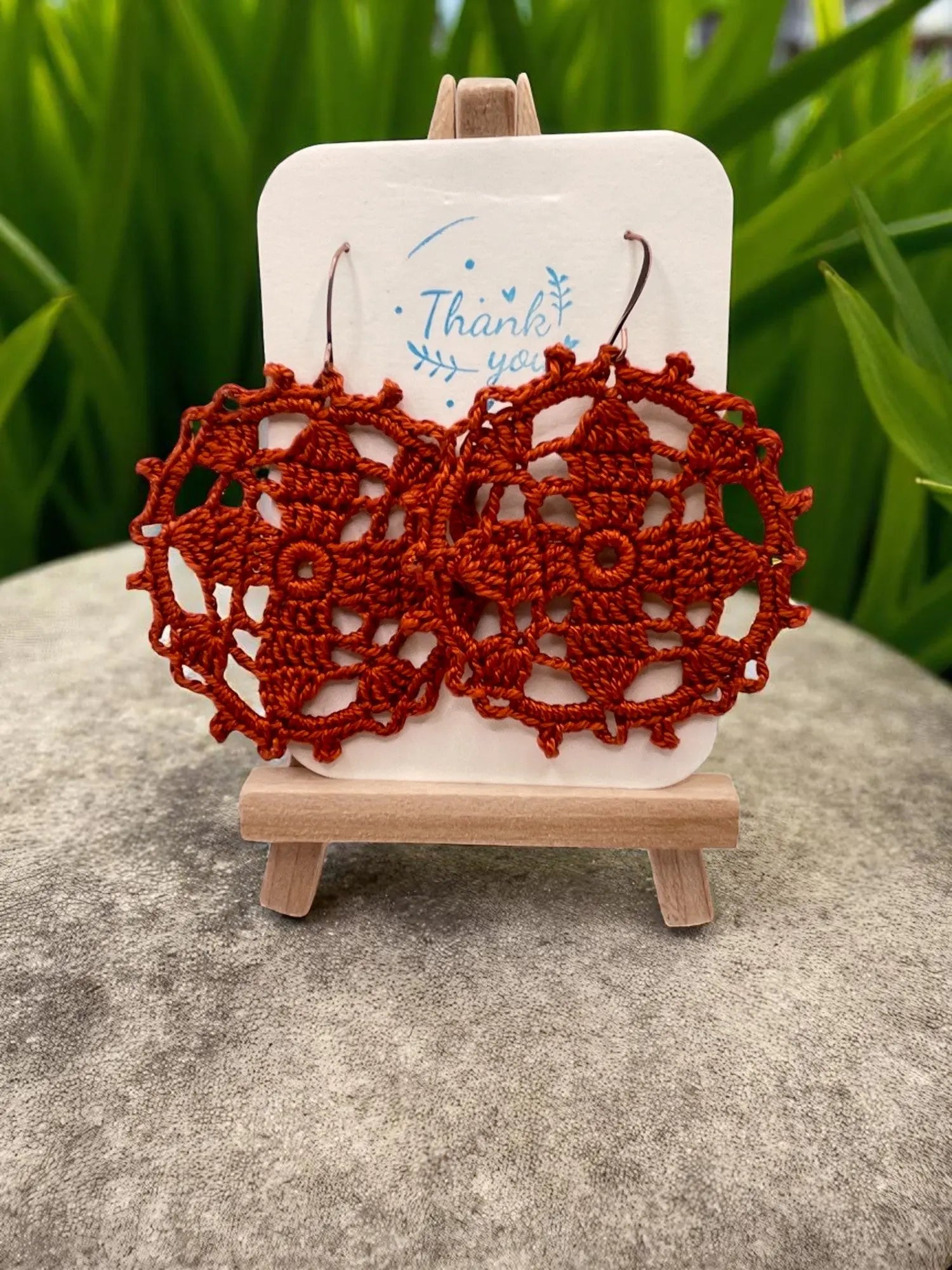 Circular earring in burnt orange Tangles & Twine