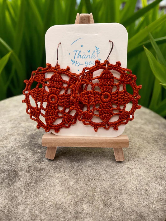 Circular earring in burnt orange Tangles & Twine