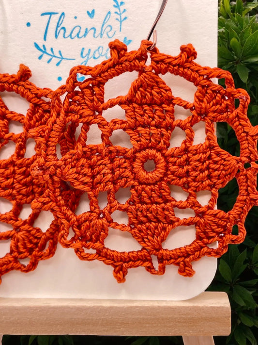 Circular earring in burnt orange Tangles & Twine