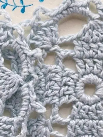 Circular earring in pale blueish gray Tangles & Twine