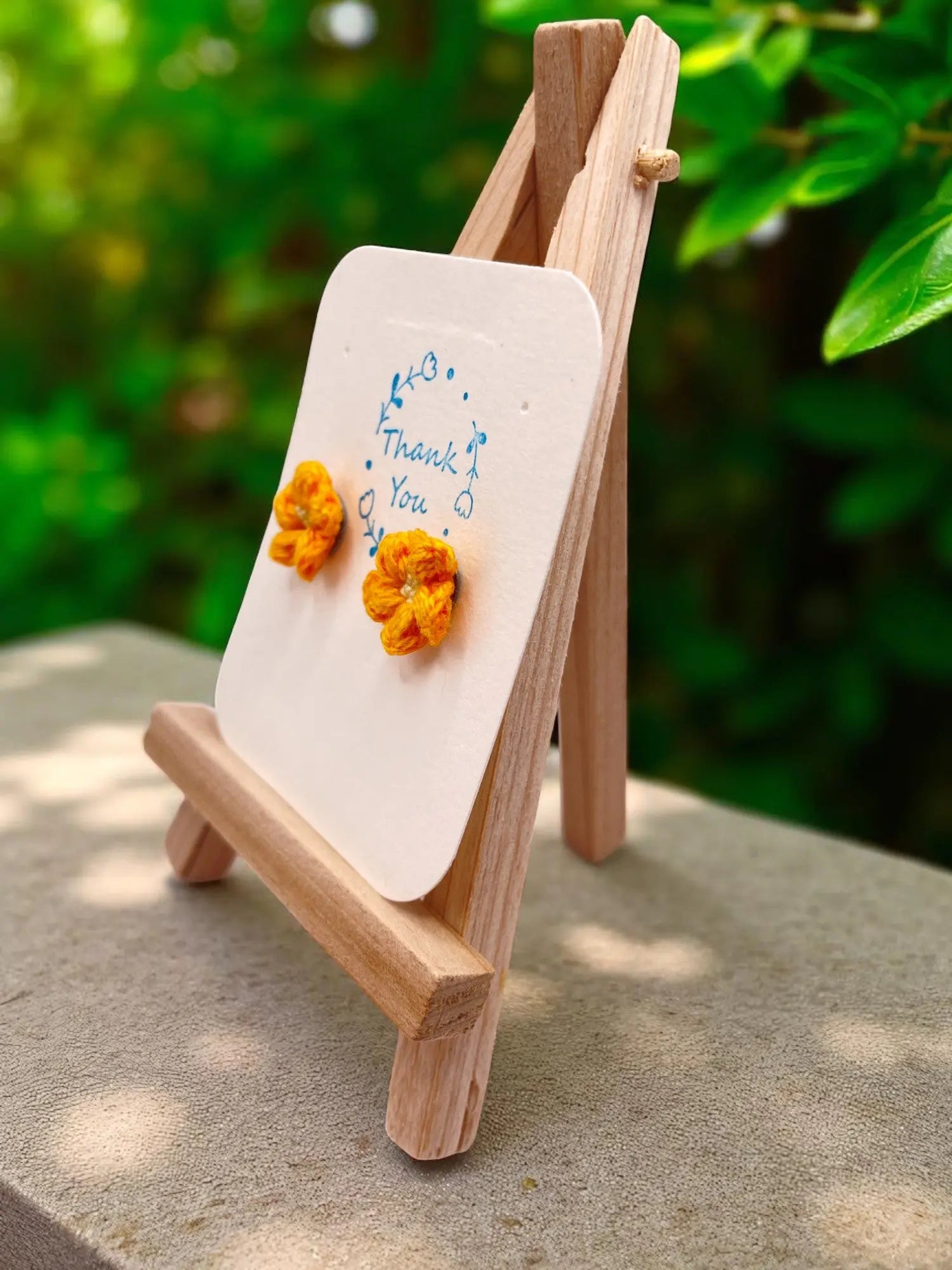 Floral stud in orange (#5) Tangles & Twine