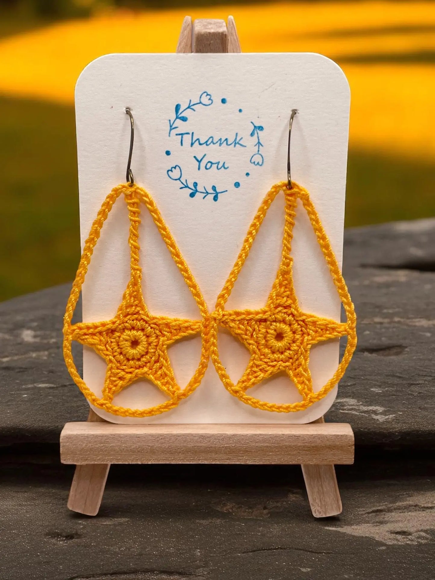 Dangling star in yellow Tangles & Twine