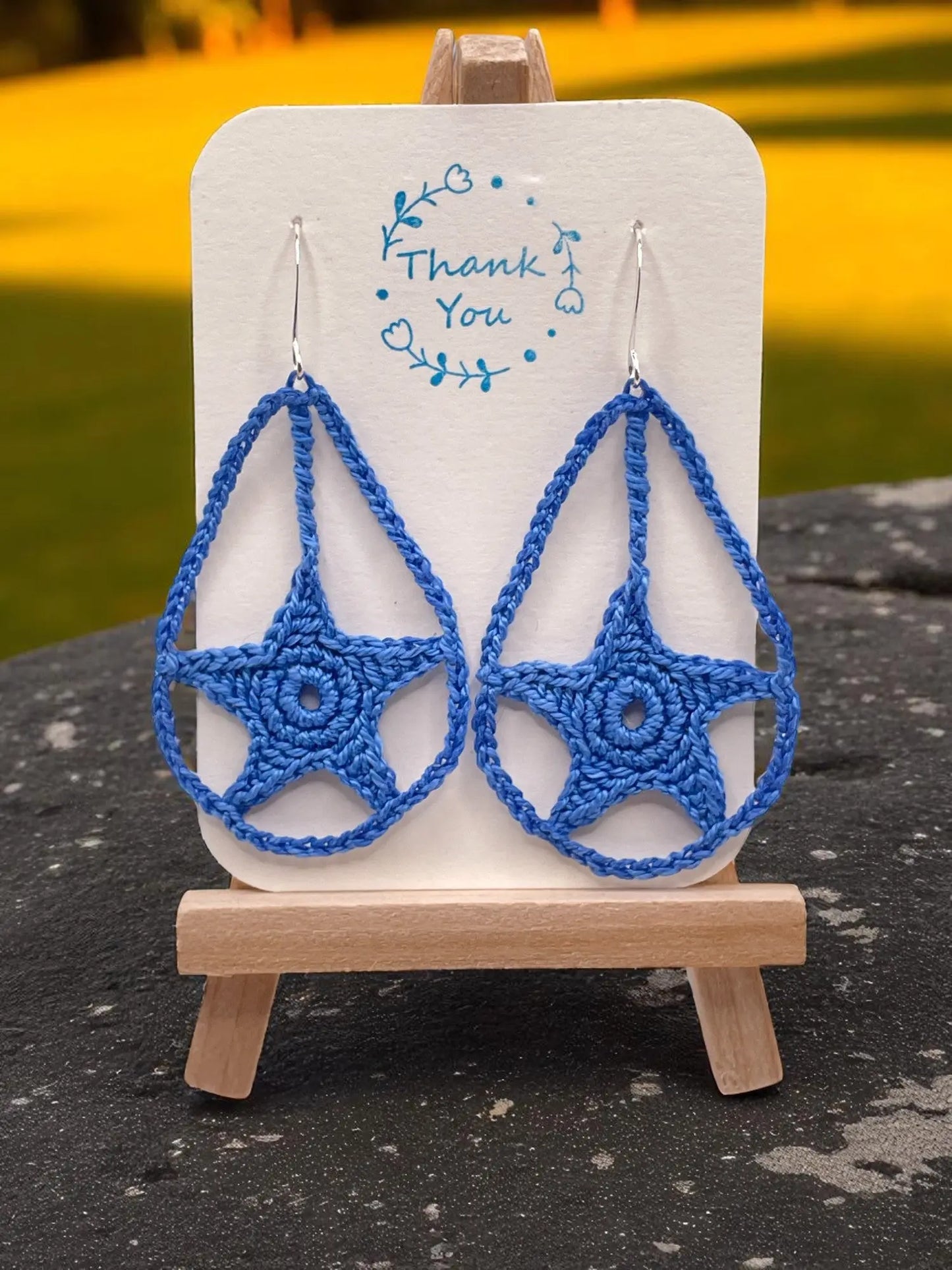 Dangling star in blue Tangles & Twine