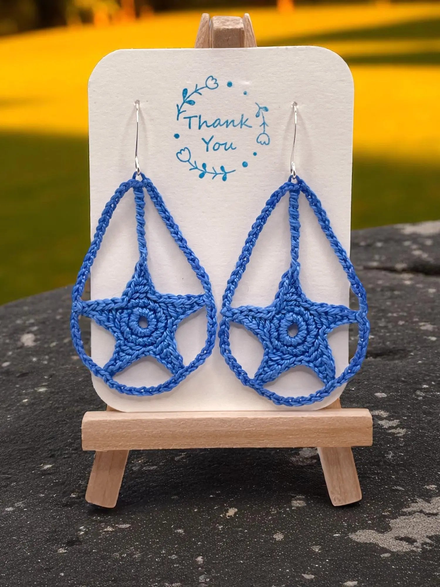 Dangling star in blue Tangles & Twine