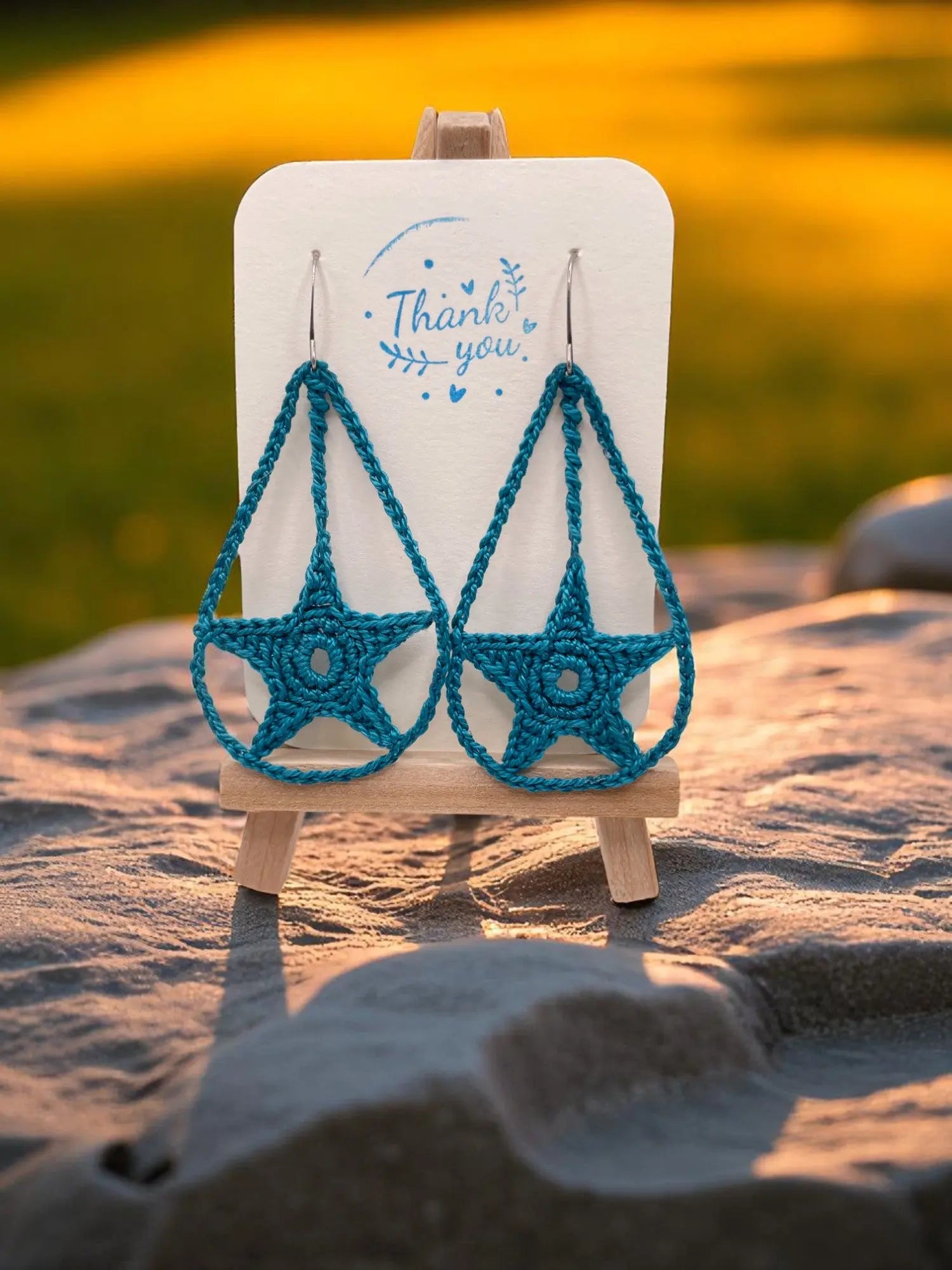 Dangling star in teal Tangles & Twine