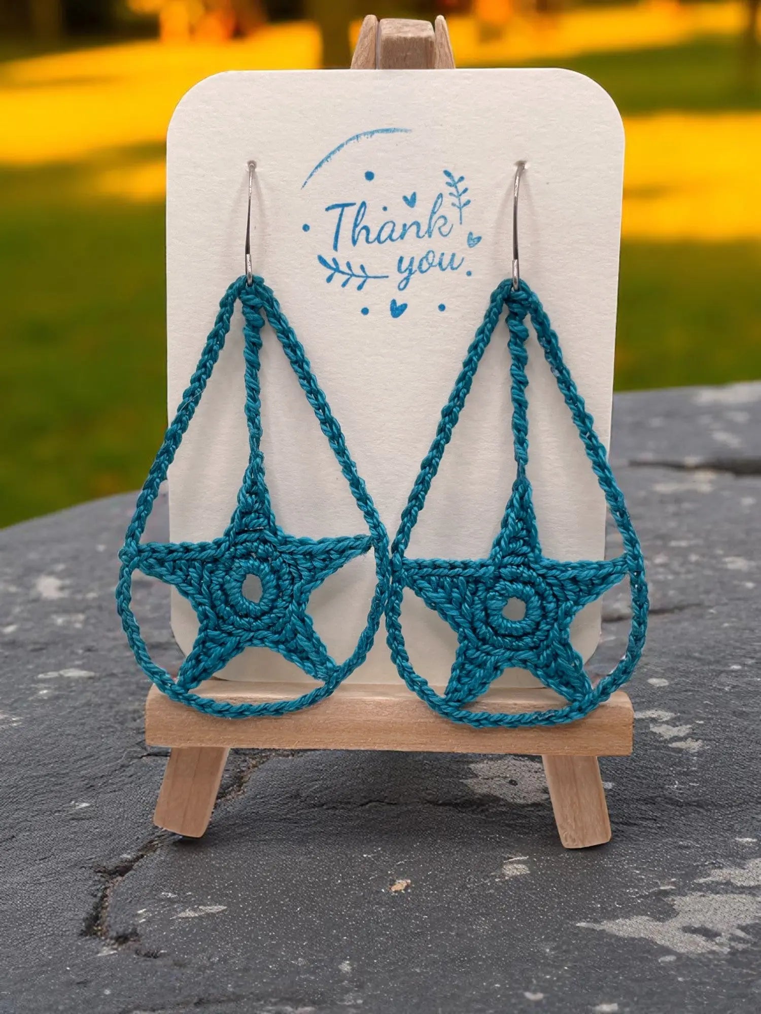 Dangling star in teal Tangles & Twine