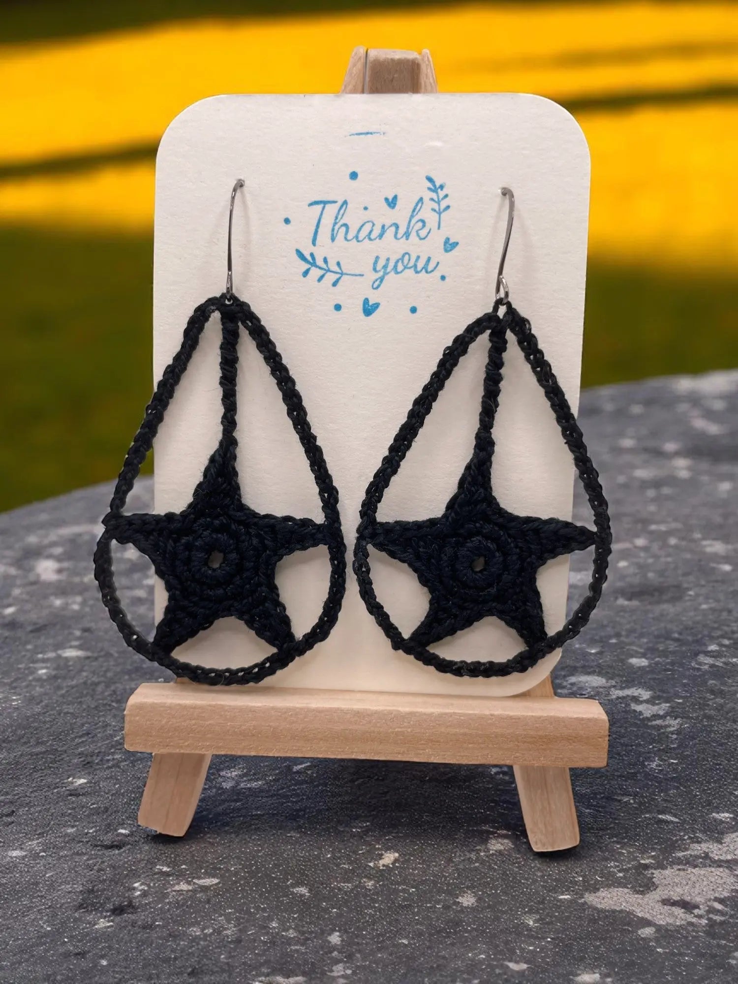 Dangling star in black Tangles & Twine