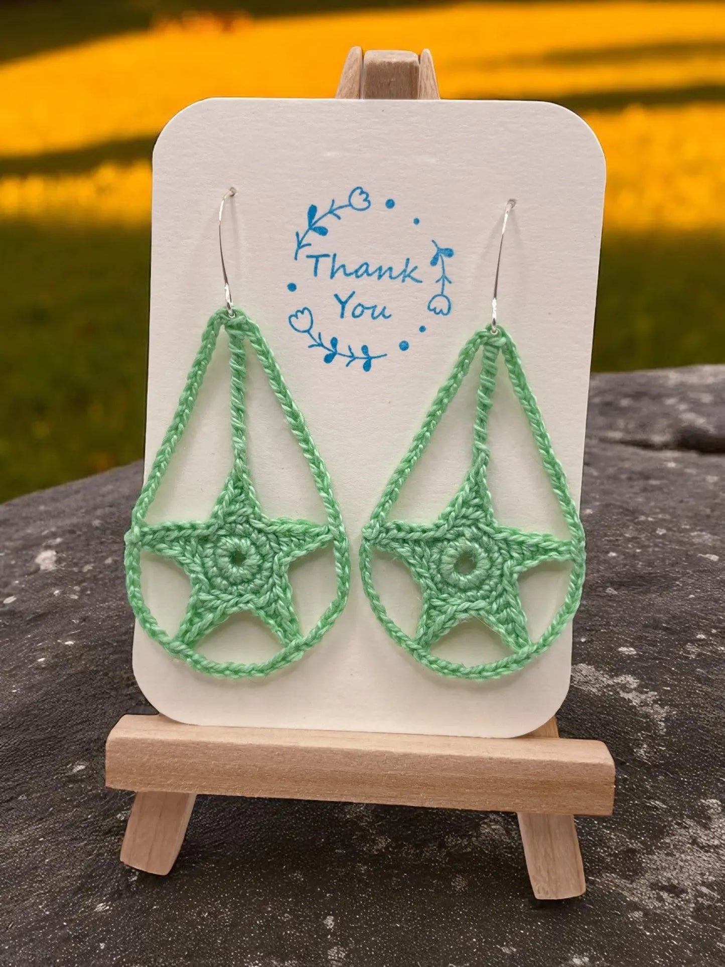 Dangling star in green Tangles & Twine