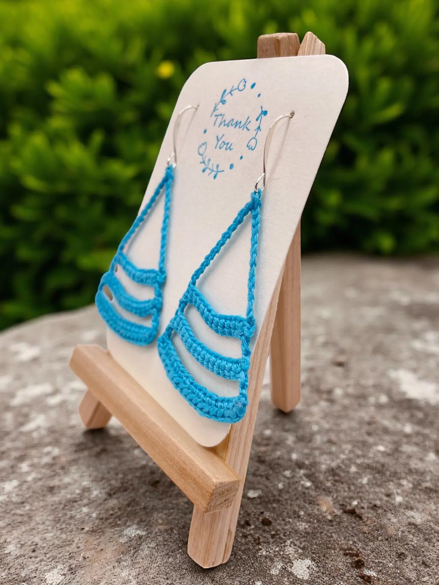 Dangling smiles in sky blue Tangles & Twine