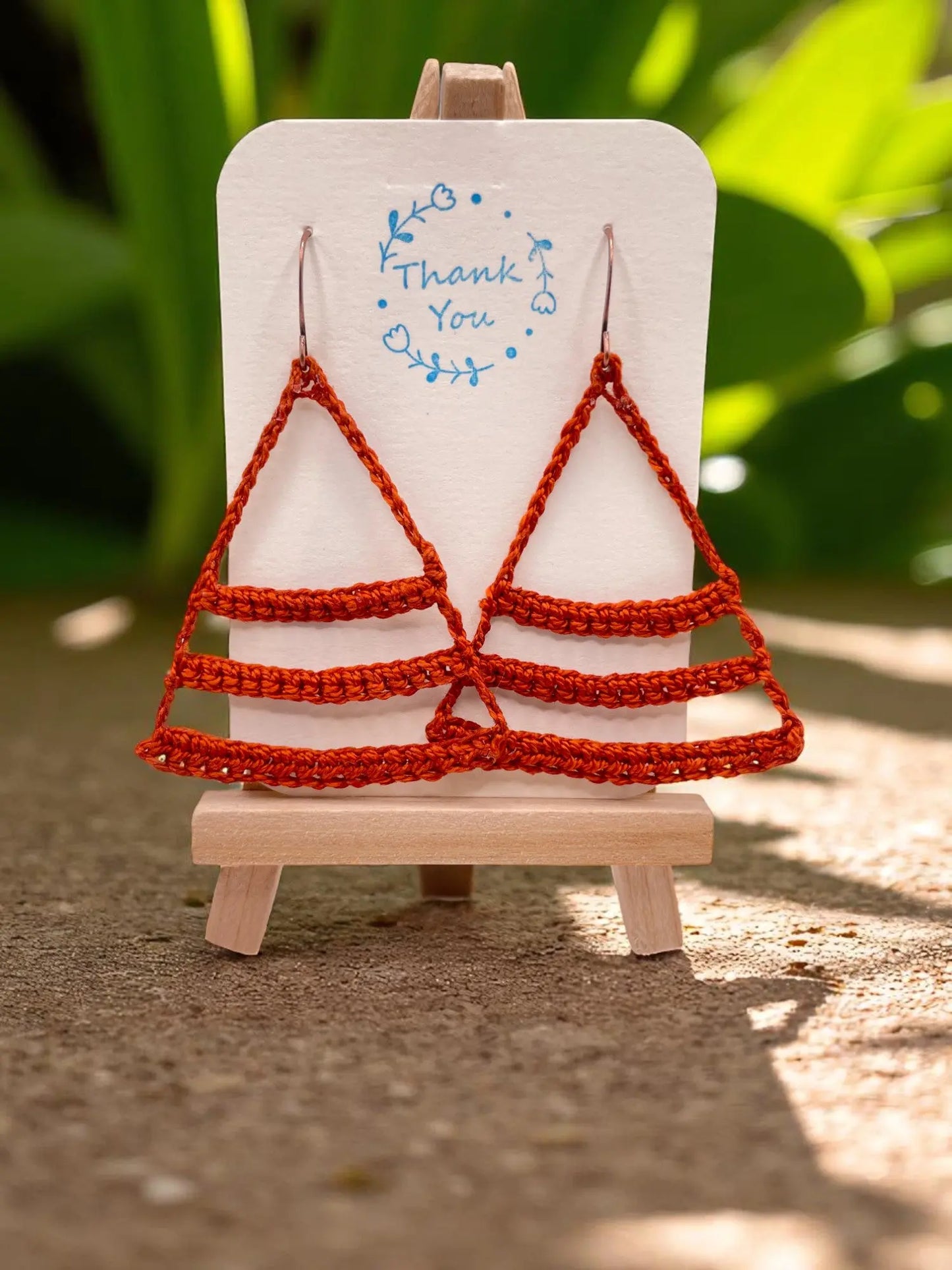 Dangling smiles in burnt orange Tangles & Twine