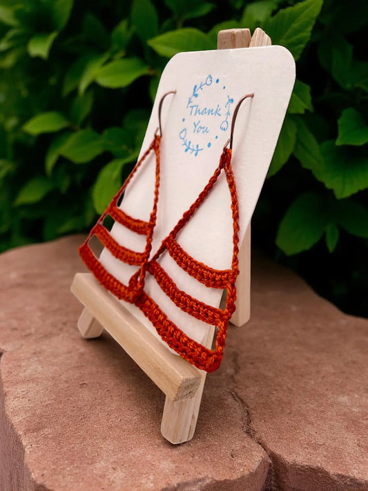 Dangling smiles in burnt orange Tangles & Twine