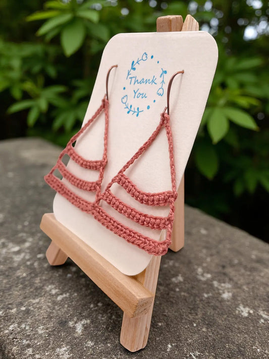 Dangling smiles in blush Tangles & Twine