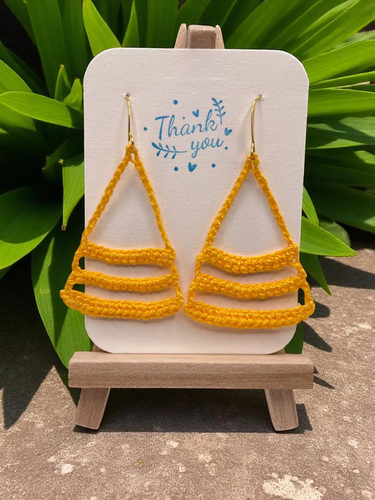 Dangling smiles in yellow Tangles & Twine