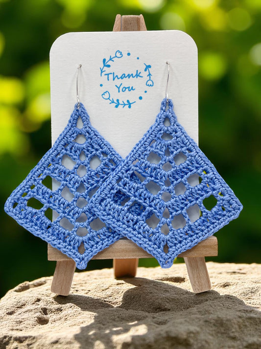 Fancy triangle in cornflower blue