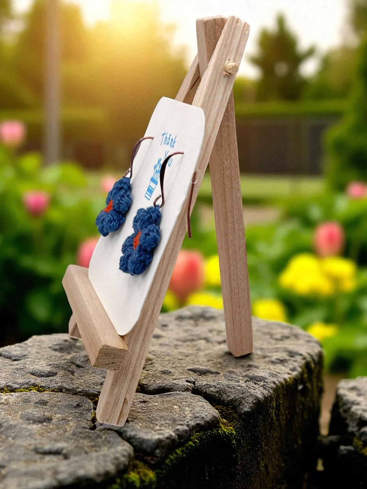 Dangly Puff Flower in dark blue Tangles & Twine