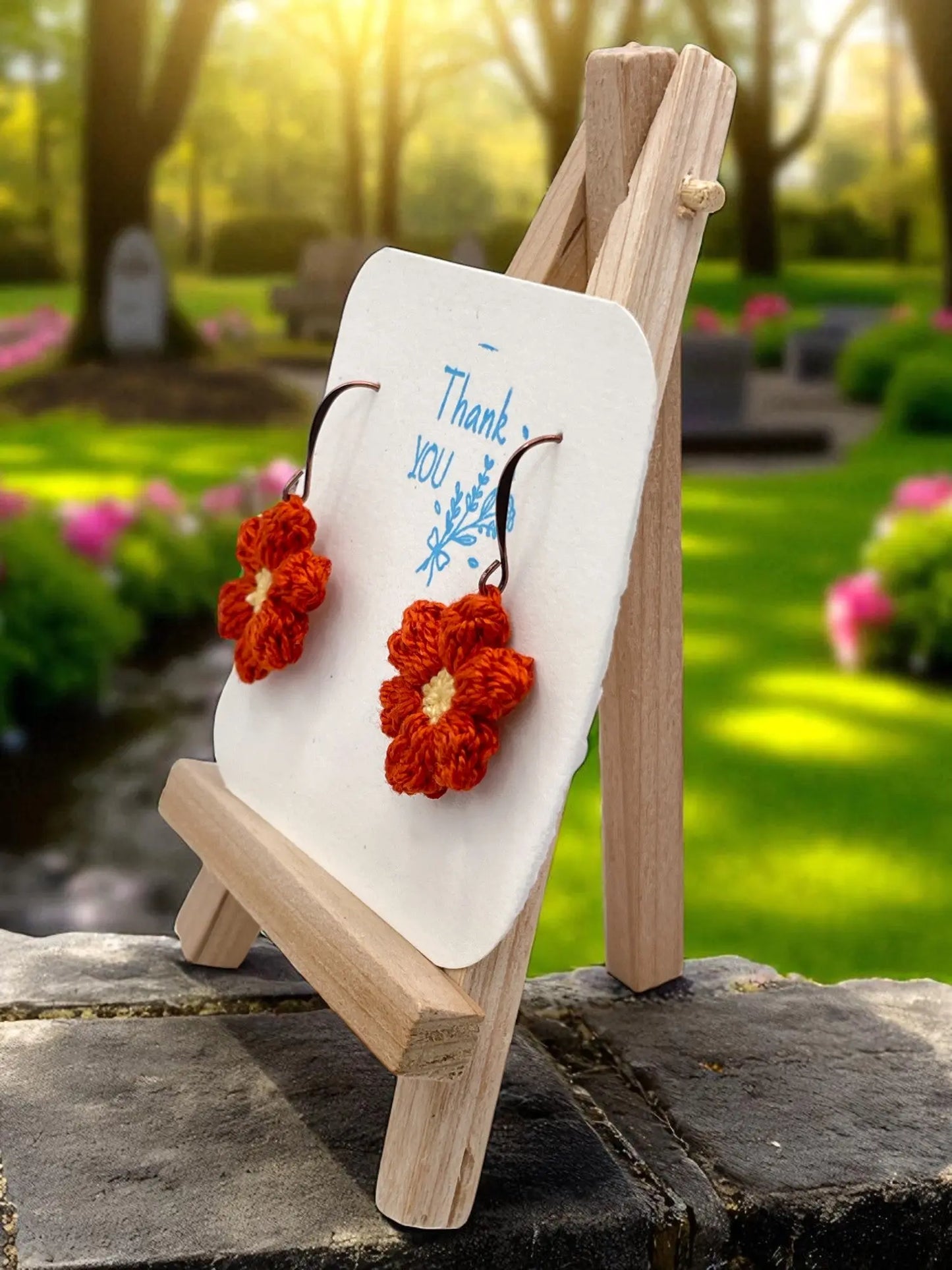 Dangly Puff Flower in burnt orange Tangles & Twine